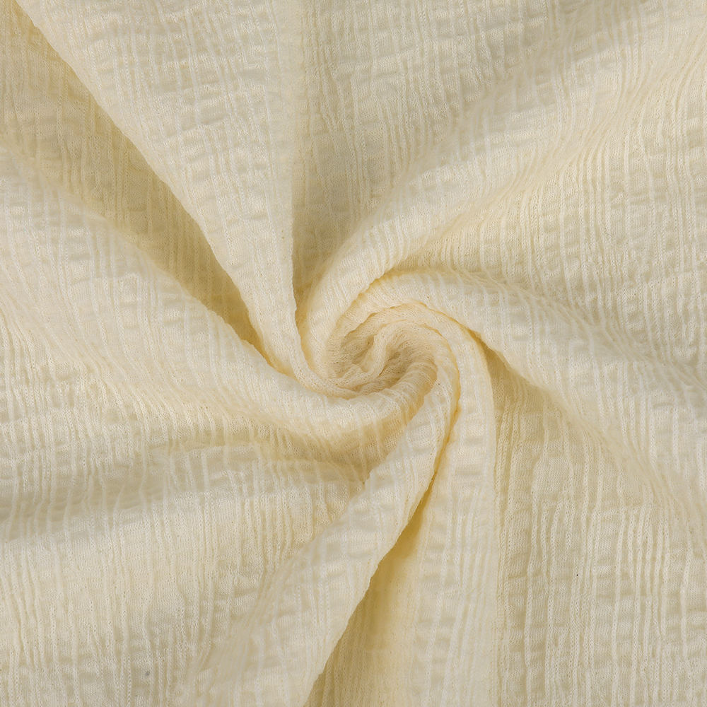 Jacquard aon-taobhach breathable an t-olann atá neamhdhíobhálach don chomhshaol fabraic chniotáilte bean chniotáilte